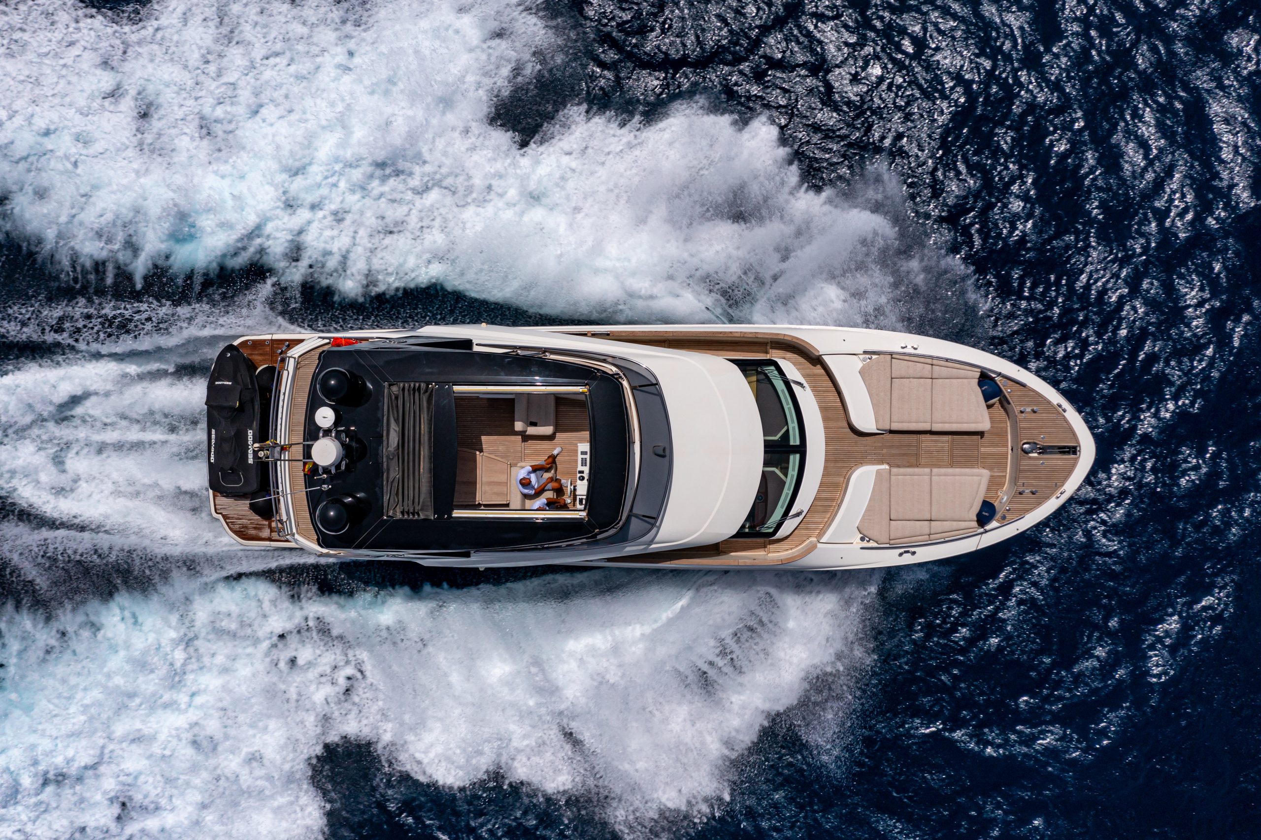 Motor yacht under way off the Costa Blanca, where we transfer owners, guests and crew to the marinas